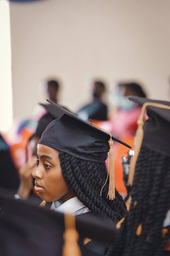 Graduation ceremony featuring university students in caps and gowns in Nairobi, Kenya.